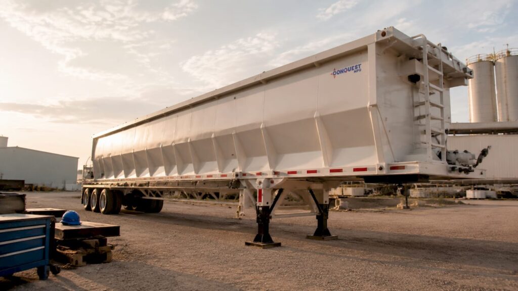 Bulk storage pig trailer setup at industrial site